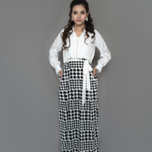 Pure cotton silk and Scottish net long dress finished with pearls on neck slit.